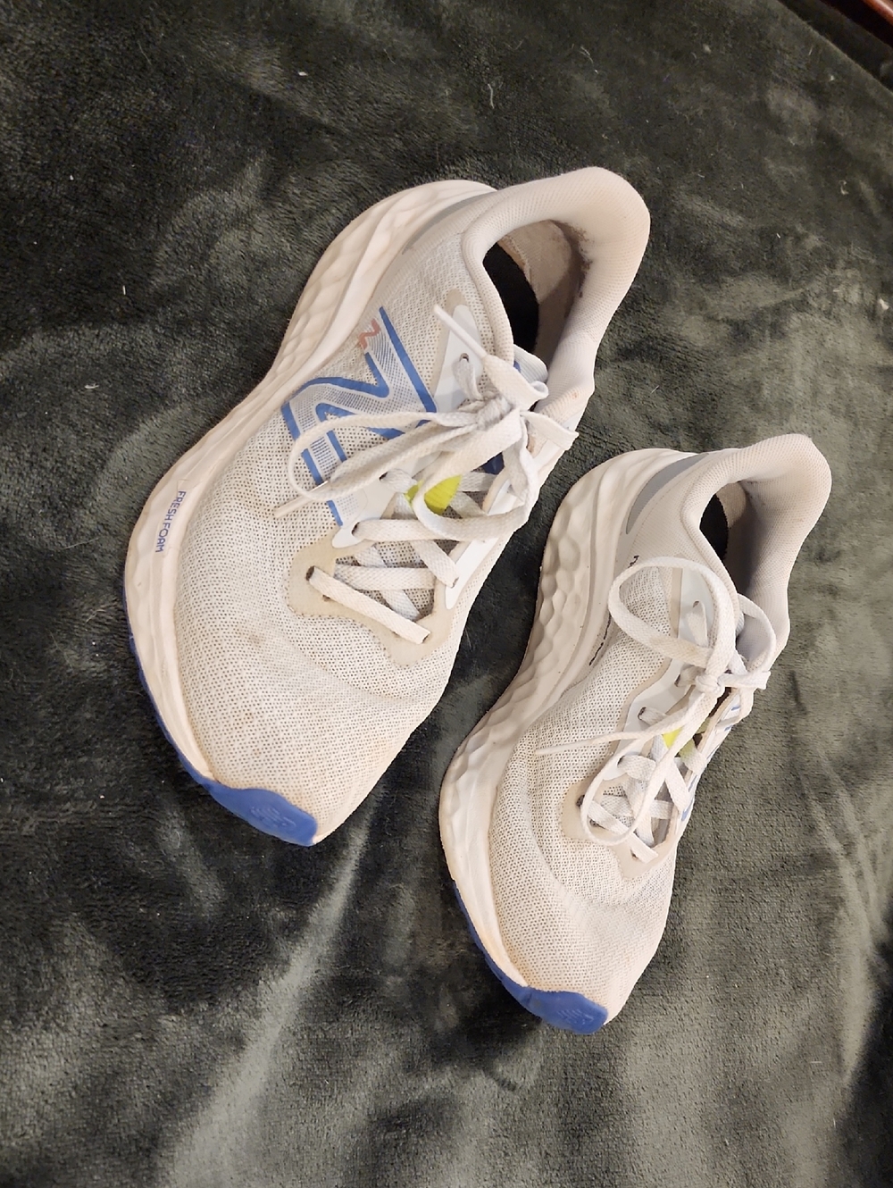 New Balance Women's Light Blue Athletic Shoes with Blue and Silver Accents